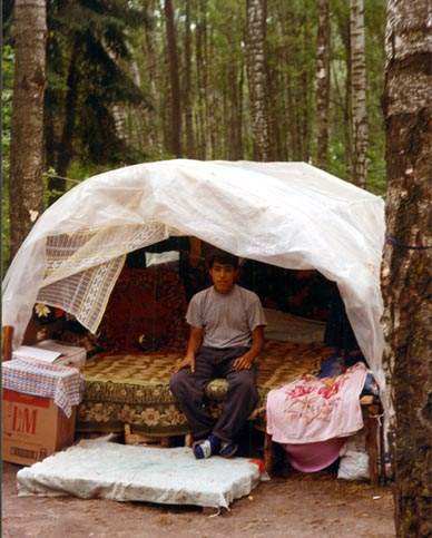 Etnographer Nicolay Bessonov. Moldavian gypsy-boy in camp. 