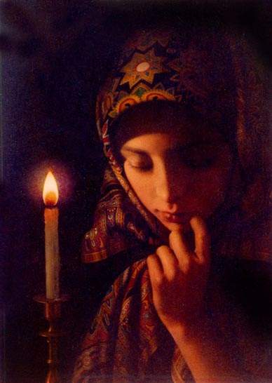 Prayer. Girl with a candle